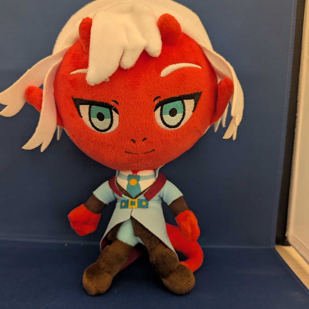 Red and White Plush Toy